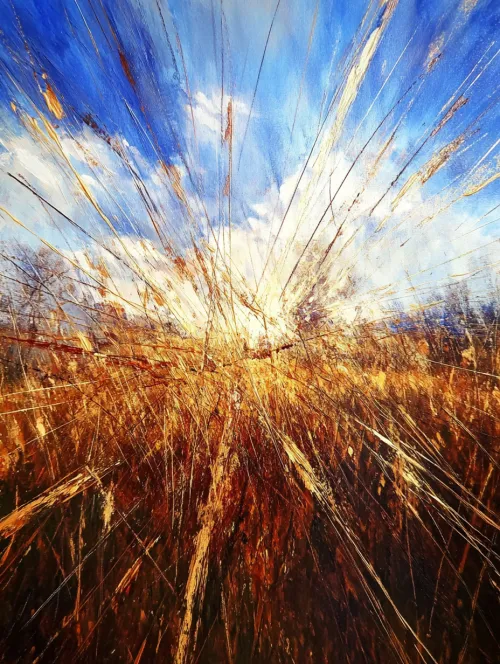 Brillante atardecer con rayos de luz filtrándose a través de la hierba