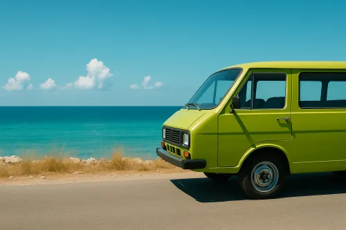 Green shuttle bus on the seashore with a cloudy sky