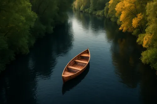 Wooden boat on the mirror-like surface of a river among green trees