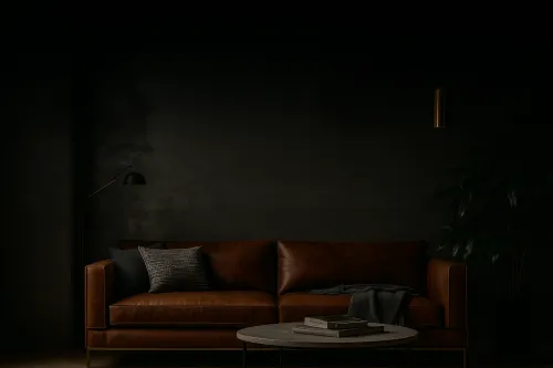 Leather sofa and table in a cozy dark room