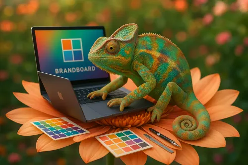 La lagartija trabaja en un portátil, rodeada de flores y paletas de colores