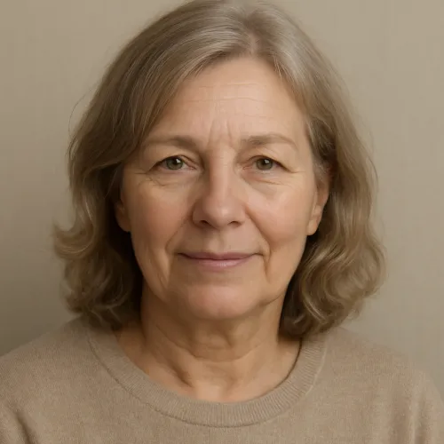 Portrait of a middle-aged woman with gray hair and light clothing
