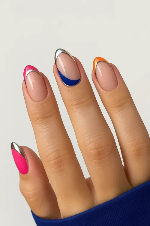Nails with vibrant colors and metallic elements for a stylish manicure