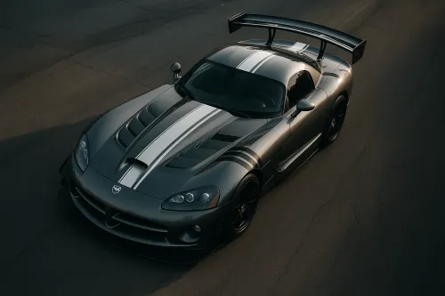 Dodge Viper with Gray Stripes on Black Body Stands on the Road