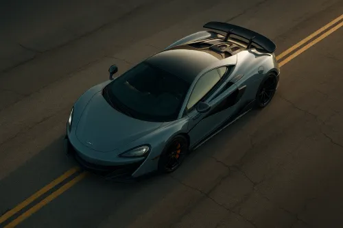Modern sports car McLaren on a paved road