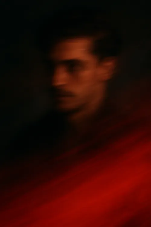 Portrait of a man with a blurred effect against a background of soft colors