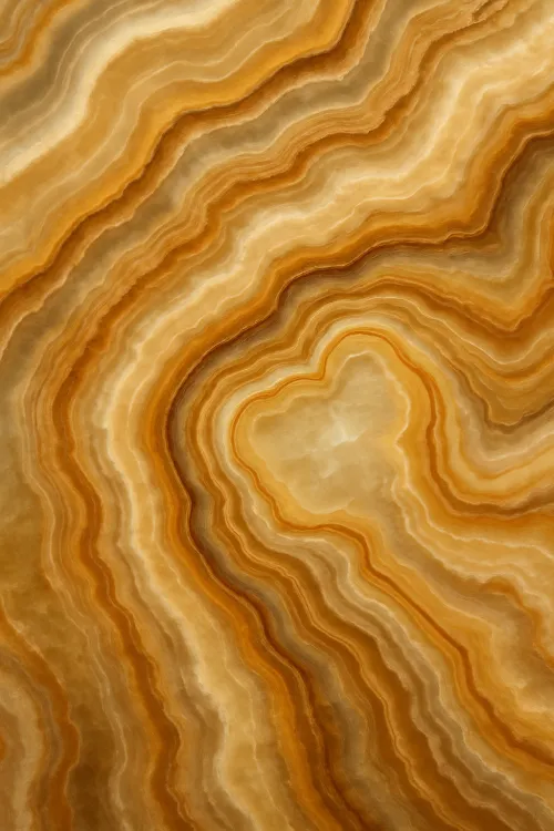 Primer plano de la textura de una piedra natural con líneas suaves y matices marrones