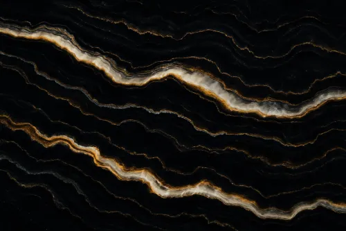 Image of black onyx with golden stripes and wavy textures