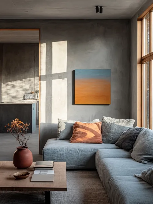 Cozy living room with gray walls and abstract art on the wall