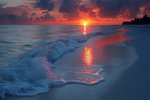 Stunning sunset over the calm ocean and gentle waves