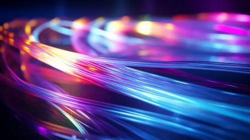 Colorful light fibers on a dark background with a blur effect
