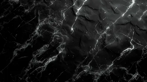 Black marble background with prominent white veins