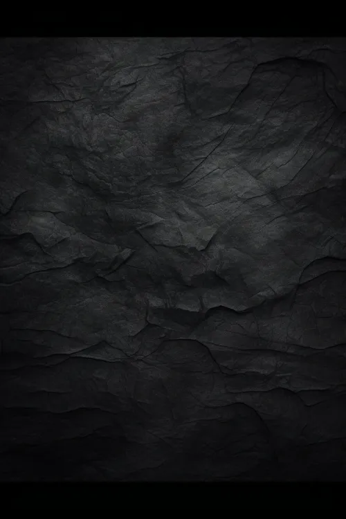 Background with a black texture of worn paper with noticeable creases
