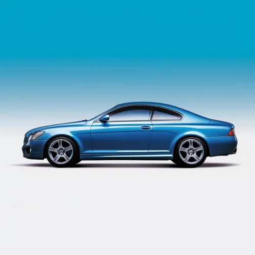 Side view of a stylish blue Mercedes coupe against a gradient background