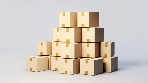 Stack of various brown boxes with labels