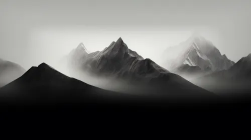 Misty mountain landscape with high peaks and horizon