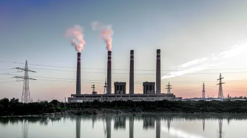 Industrial landscape with a power plant and smoke stacks