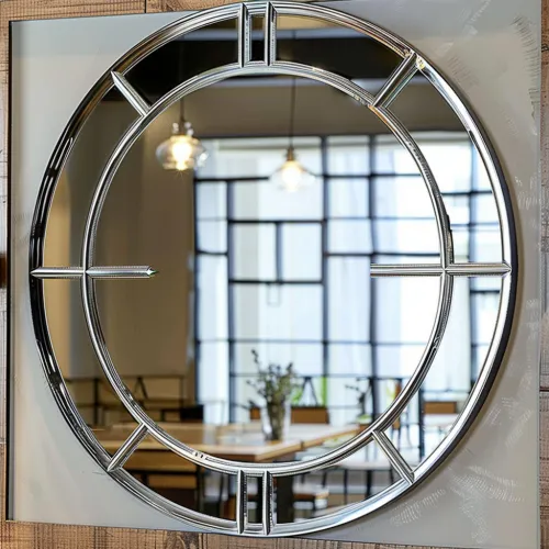 Close-up of a decorative mirror with an unusual round metal frame