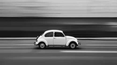White car in motion on a blurred city background