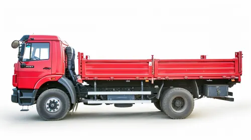 Side view of a red truck with an open bed
