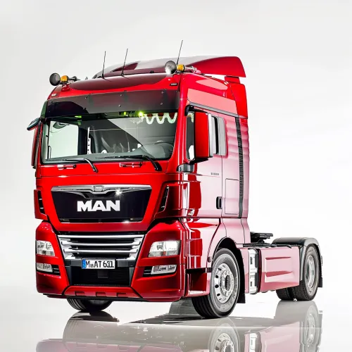 MAN truck in bright red color on a white background