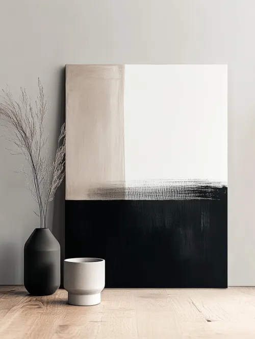 Abstract canvas in black and white tones featuring vases in the foreground