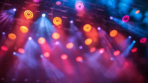Stage with colorful lights and smoke at a music event