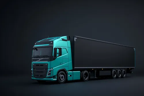 Грузовой автомобиль Volvo на фоне темной поверхности