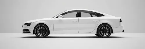Elegant white car with black rims on a gray background