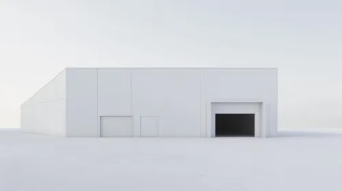 White Building with Large Gates on a Smooth Surface