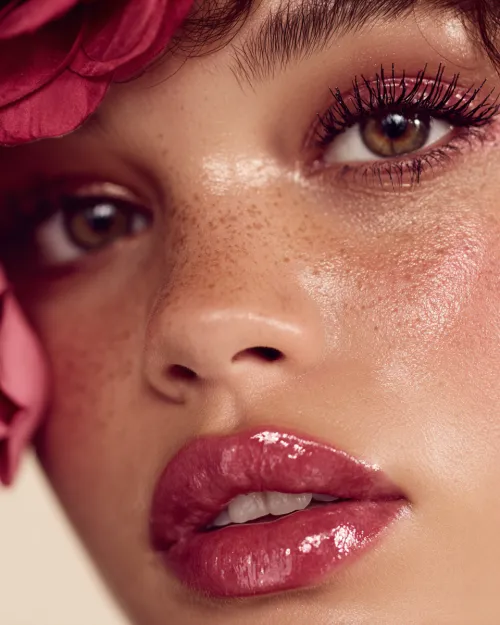 Close-up of a face with expressive lips and makeup