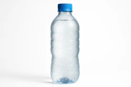 Water bottle covered with condensation droplets