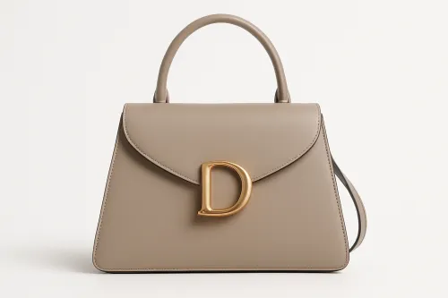 Elegant light brown bag with a metallic letter D