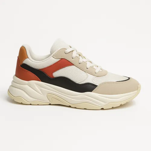 Sneakers with a mesh upper and contrasting accents, a stylish choice