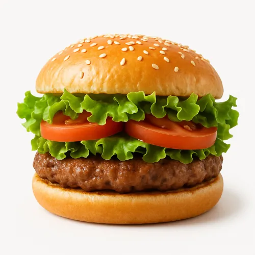 Tasty burger with a patty, fresh tomatoes, and greens