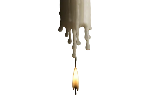 Vela encendida, goteando cera sobre un fondo negro