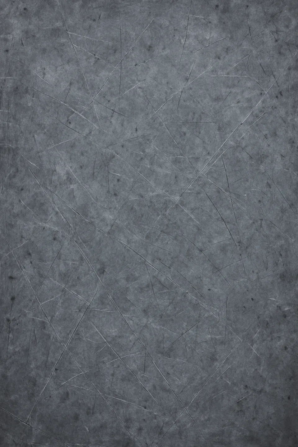 Surface with a variety of textures and fine cracks of dark gray color