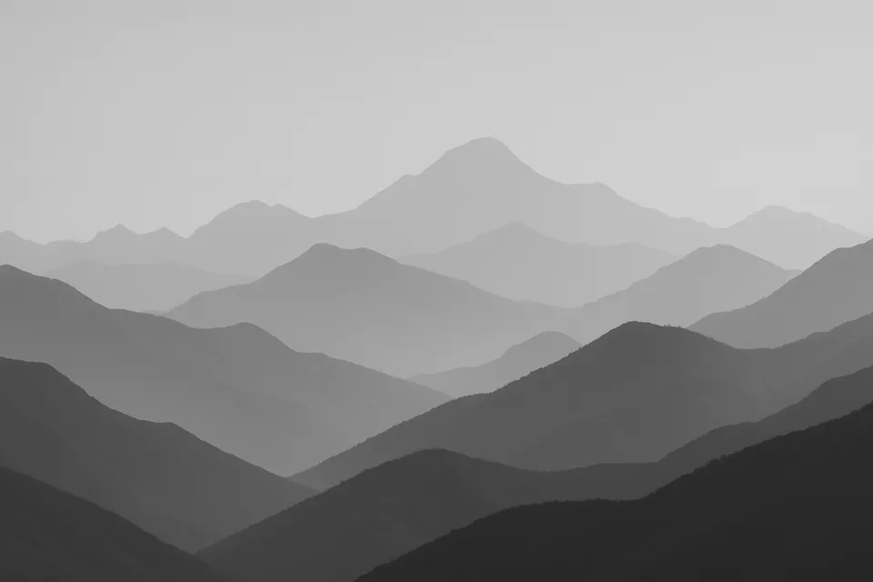 Mountain landscape with layered misty hills