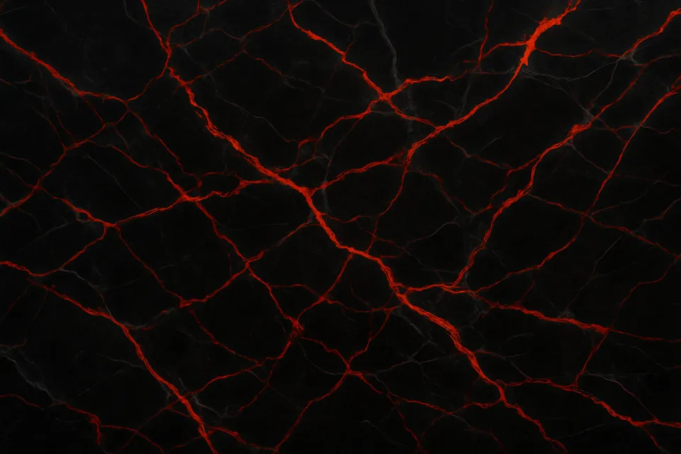 Texture of black marble with vibrant red veins