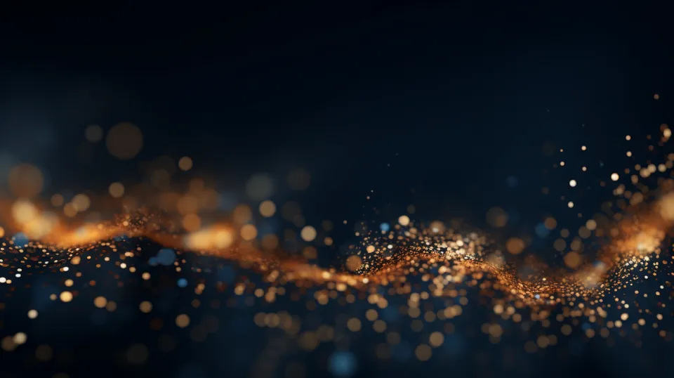 Abstract image with golden and white particles on a black background