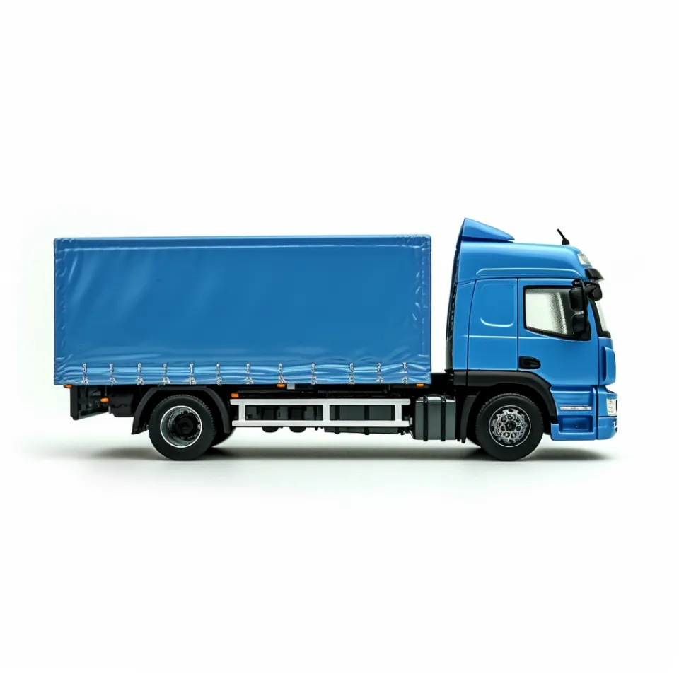 Image of a blue cargo truck with a tarp on a white background
