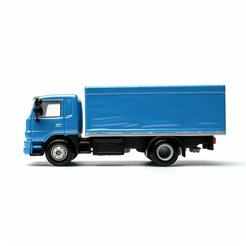 Side view of the model of a blue truck with a closed body