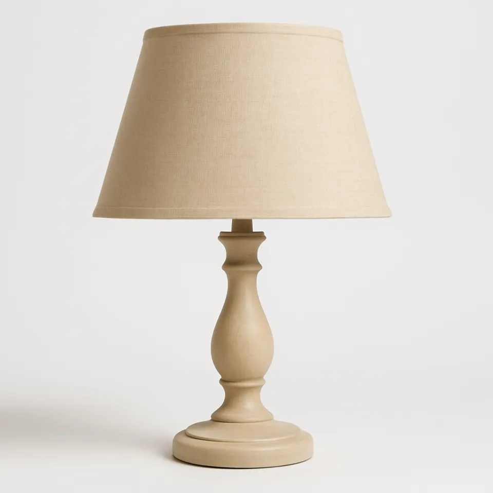 Table lamp with a textile shade and ceramic base