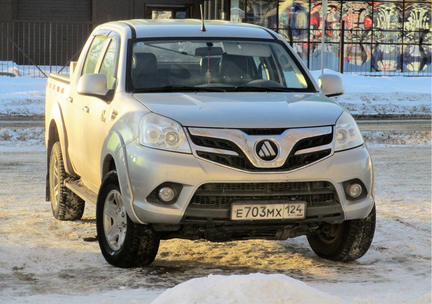 Автомобиль госномер Е703МХ124