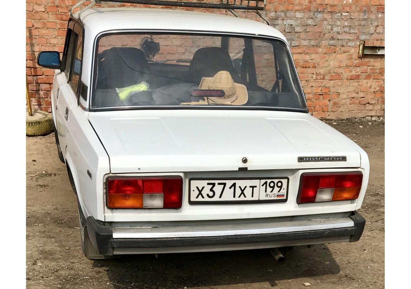 Автомобиль госномер Х371ХТ199