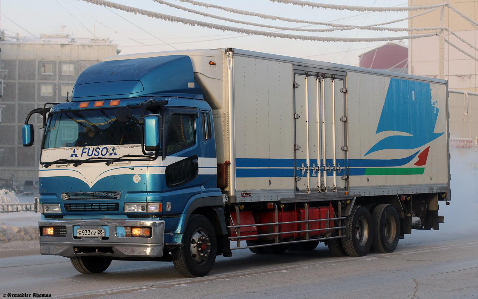 Автомобиль госномер Е933СА28