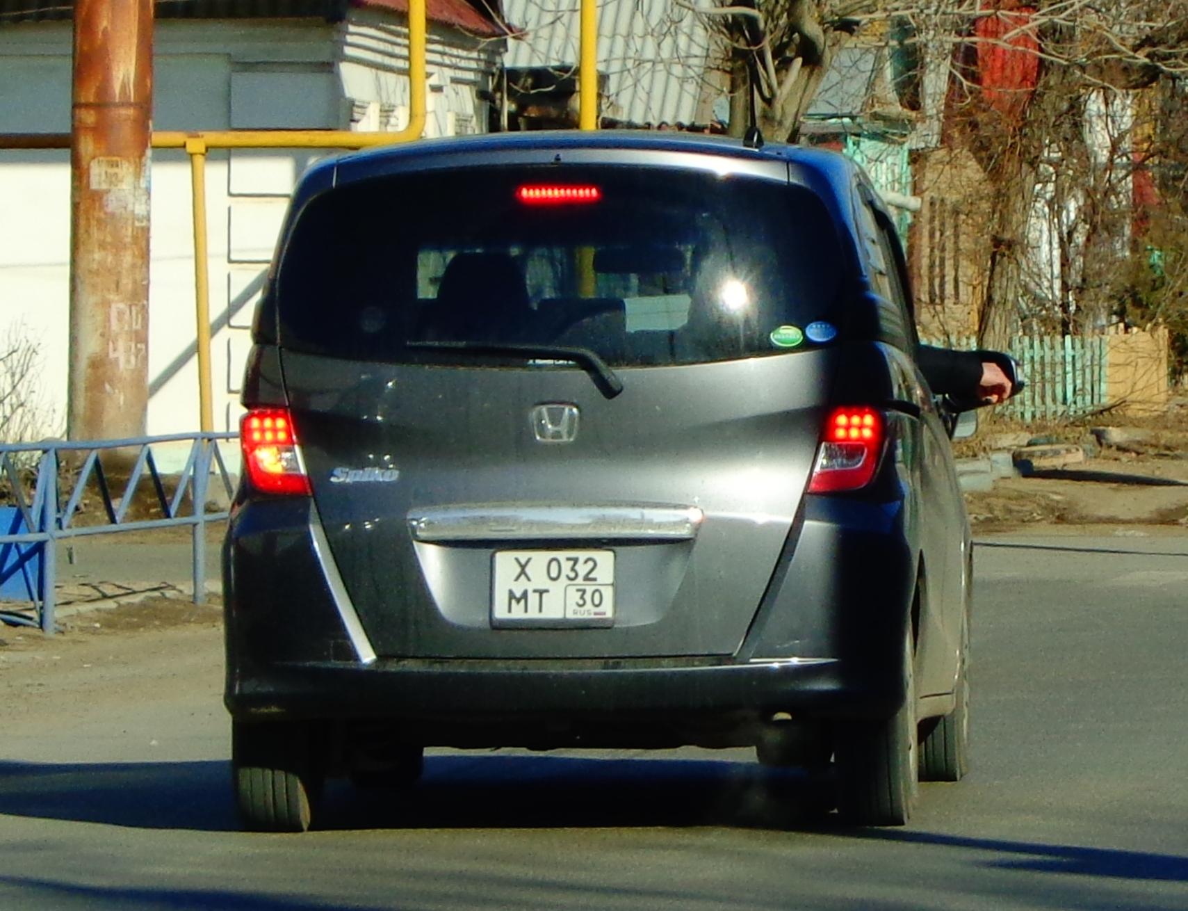 Автомобиль госномер Х032МТ30