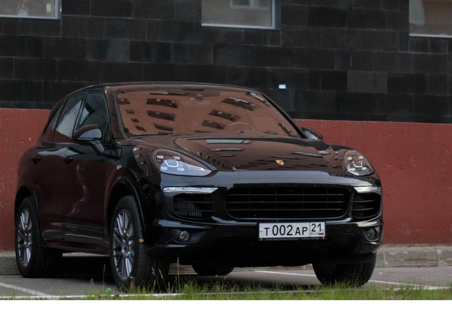 Автомобиль госномер Т002АР21