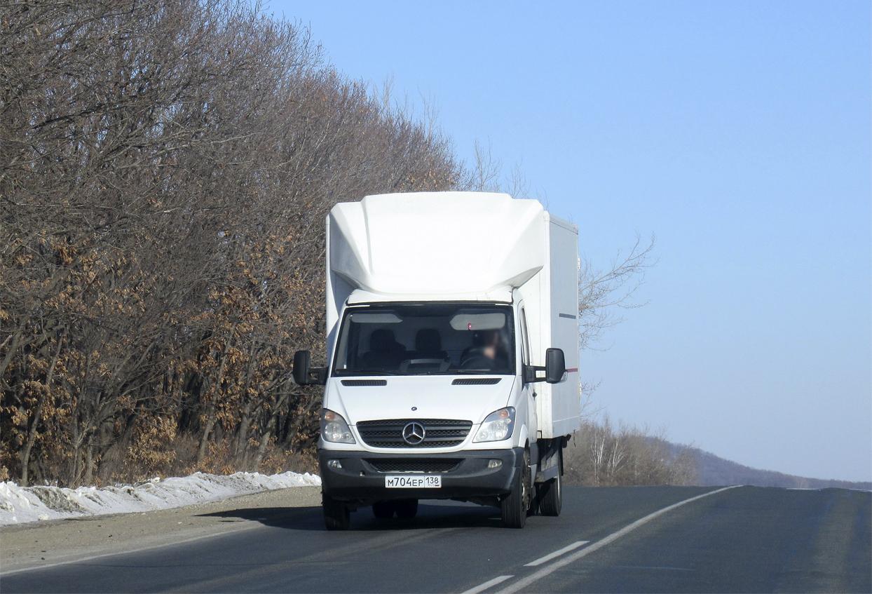 Автомобиль госномер М704ЕР138