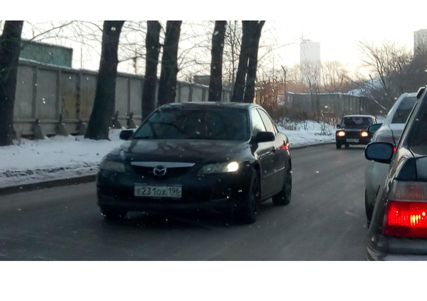 Автомобиль госномер Е231ОХ196